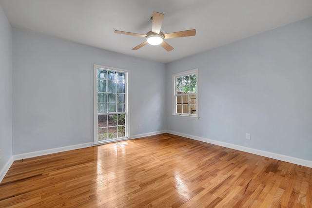 1310 E 7th Ave, Tallahassee, FL 32303 - empty room with light wood-type flooring, ceiling fan, and baseboards