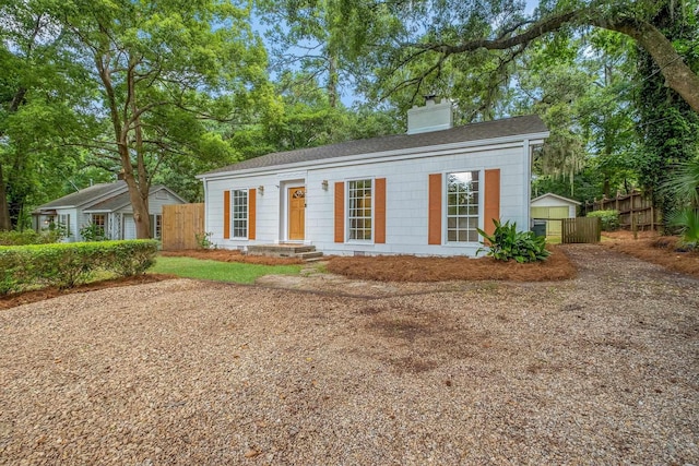 1310 E 7th Ave, Tallahassee, FL 32303 - view of front of property with a chimney and a shingled roof