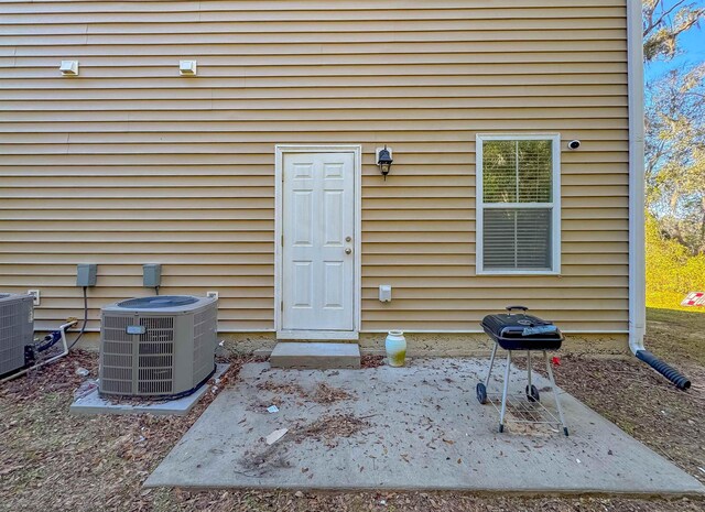 2027 Ann Arbor Ave Unit 1501, Tallahassee, FL 32304 - doorway to property with central AC unit