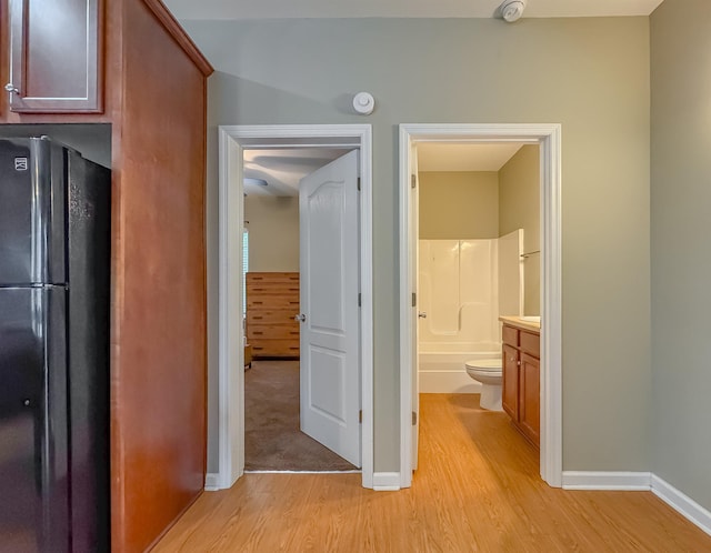 2027 Ann Arbor Ave Unit 1501, Tallahassee, FL 32304 - hall with light wood-type flooring and baseboards