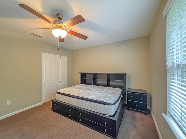 2027 Ann Arbor Ave Unit 1501, Tallahassee, FL 32304 - carpeted bedroom featuring a closet, baseboards, and a ceiling fan