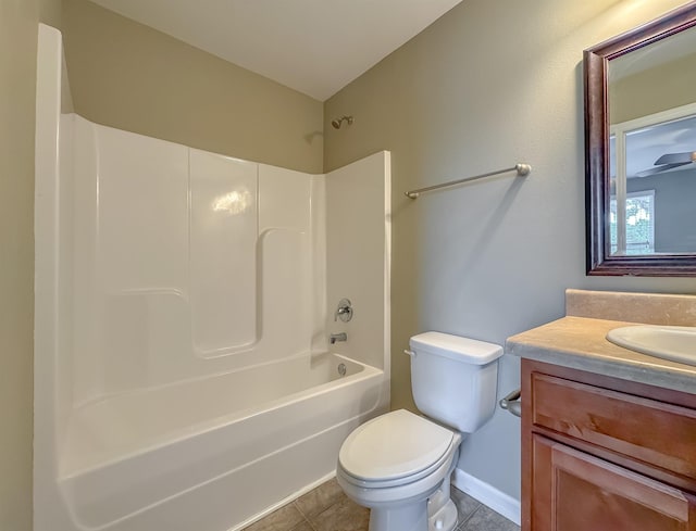 2027 Ann Arbor Ave Unit 1501, Tallahassee, FL 32304 - bathroom featuring toilet, vanity, tile patterned floors, baseboards, and shower / tub combination