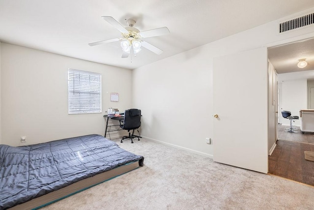 bedroom featuring ceiling fan and carpet flooring