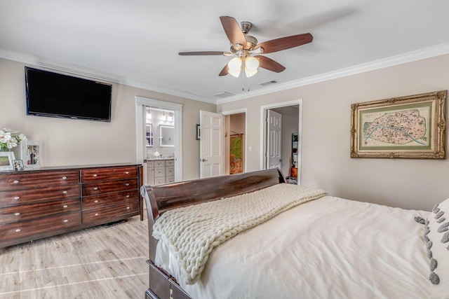 bedroom featuring crown molding, ceiling fan, connected bathroom, and light hardwood / wood-style flooring