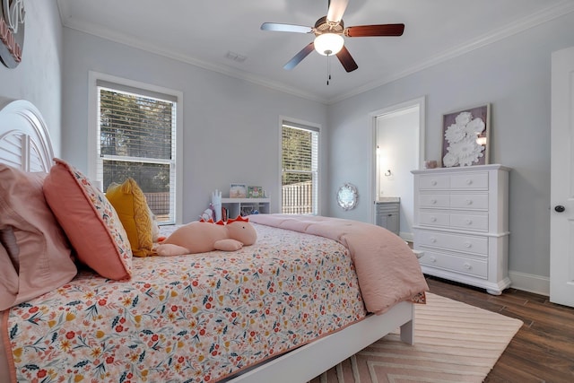 bedroom featuring ceiling fan, ornamental molding, and dark hardwood / wood-style floors