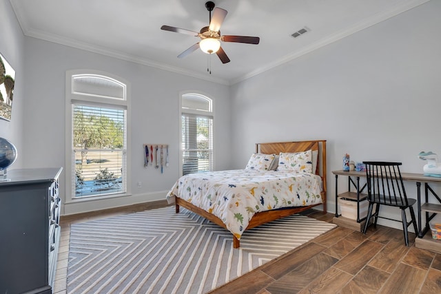 bedroom featuring ornamental molding, dark hardwood / wood-style floors, and ceiling fan