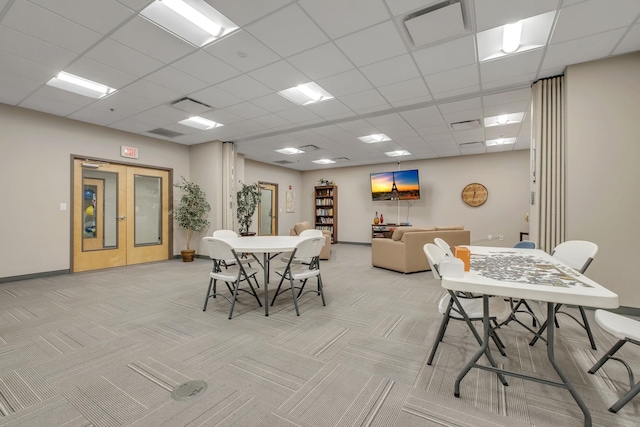 300 S Duval St Unit 1210, Tallahassee, FL 32301 - dining space with light carpet, a drop ceiling, and french doors