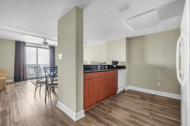 300 S Duval St Unit 1210, Tallahassee, FL 32301 - kitchen featuring dishwasher, dark wood finished floors, ceiling fan, and fridge