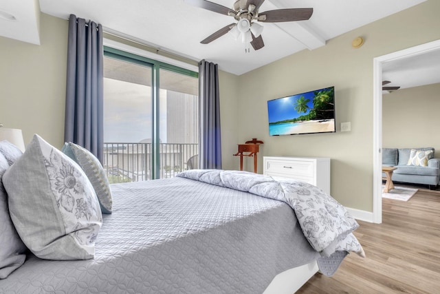 300 S Duval St Unit 1210, Tallahassee, FL 32301 - bedroom featuring access to outside, wood finished floors, ceiling fan, and beamed ceiling