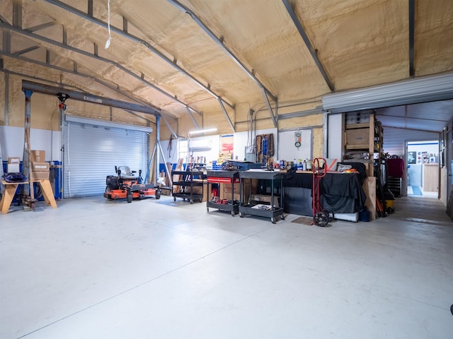 garage with a workshop area