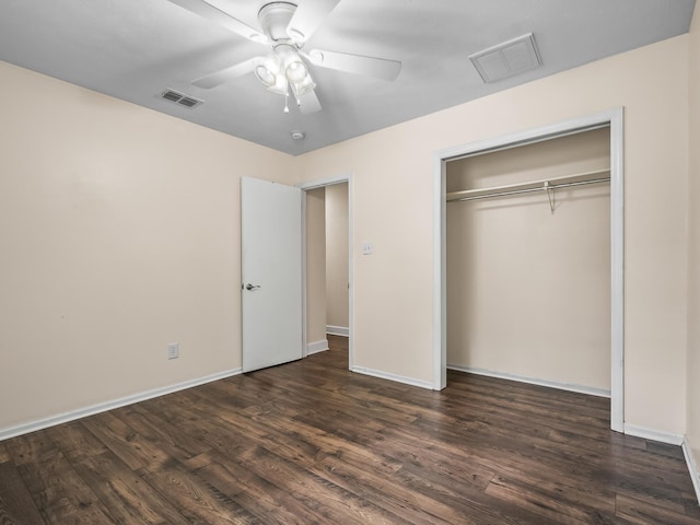 unfurnished bedroom featuring visible vents, baseboards, and dark wood finished floors