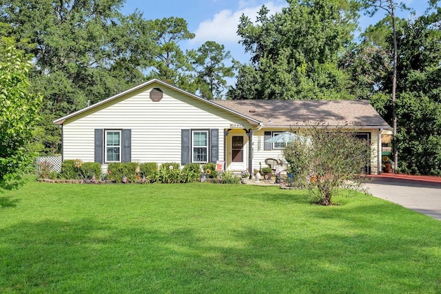 ranch-style home featuring a front yard