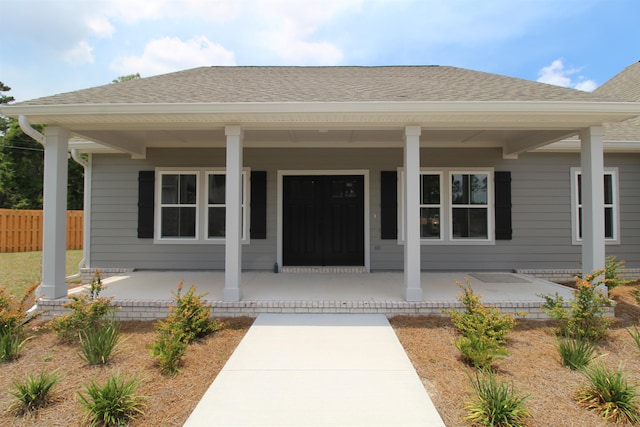 entrance to property with a porch