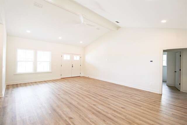 unfurnished living room featuring high vaulted ceiling, beamed ceiling, ceiling fan, and light hardwood / wood-style floors