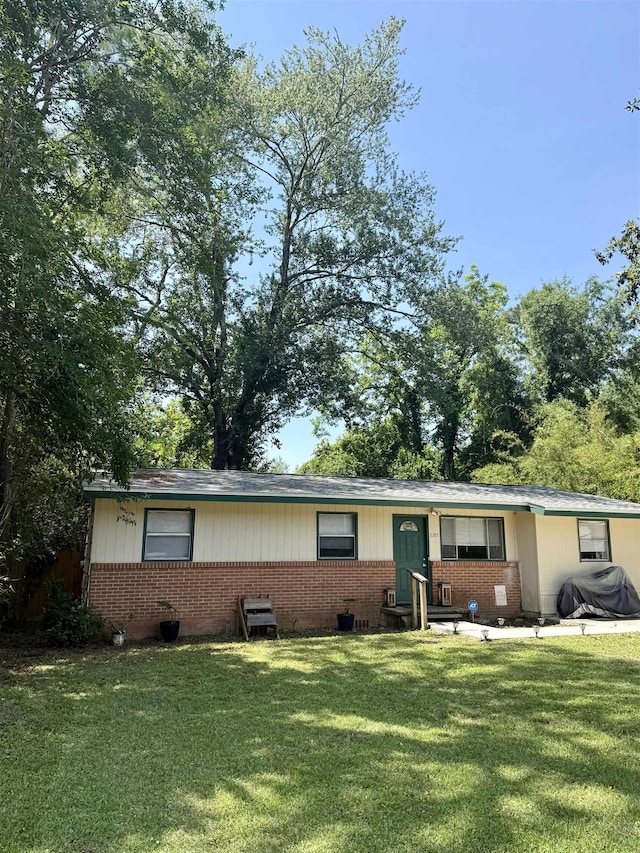2105 Belle Vue Way, Tallahassee, FL 32304 - ranch-style house with brick siding and a front yard