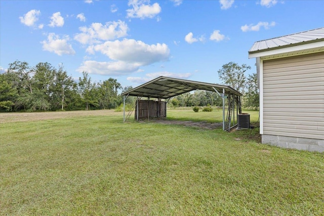 1439 W Lyman Hendry Rd, Perry, FL 32347 - view of grassy yard with a detached carport