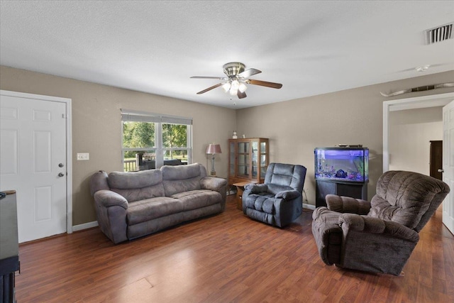 1439 W Lyman Hendry Rd, Perry, FL 32347 - living area with a ceiling fan and wood finished floors