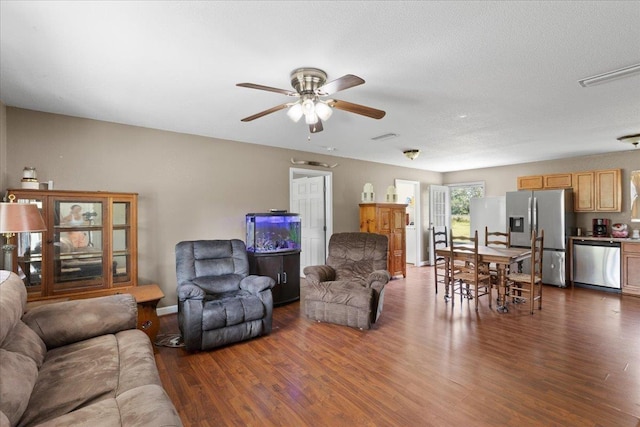 1439 W Lyman Hendry Rd, Perry, FL 32347 - living room featuring wood finished floors and a ceiling fan