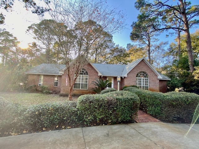 ranch-style home with brick siding