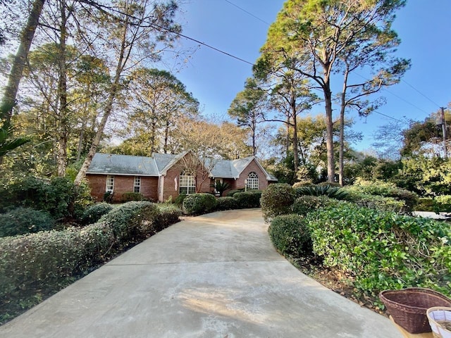 view of front of house with brick siding