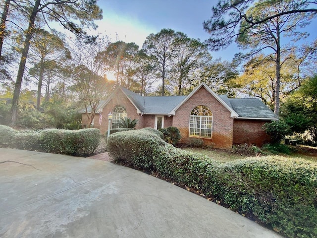 view of front of house featuring brick siding