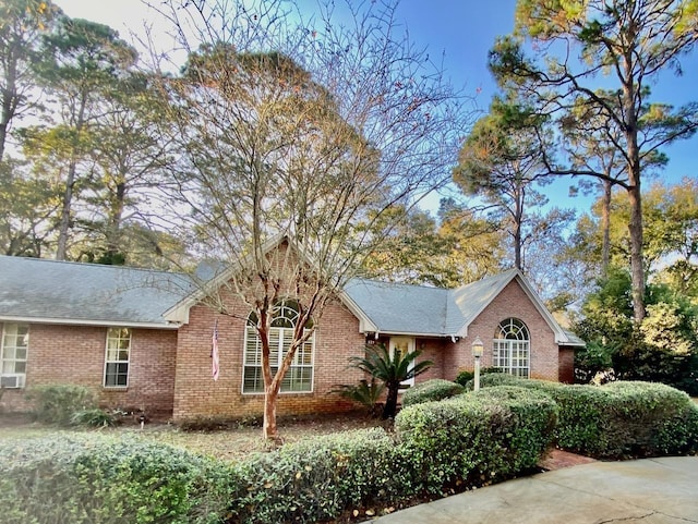 view of front of house with brick siding