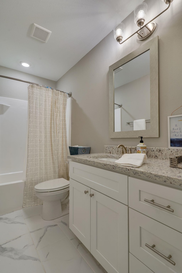 624 W 7th Ave, Tallahassee, FL 32303 - full bathroom featuring vanity, marble finish floors, shower / tub combo, and recessed lighting