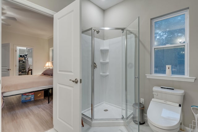 624 W 7th Ave, Tallahassee, FL 32303 - ensuite bathroom with a stall shower, crown molding, and wood finished floors