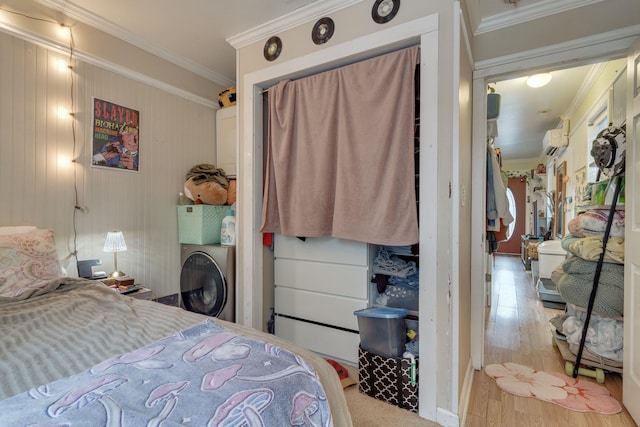 624 W 7th Ave, Tallahassee, FL 32303 - bedroom featuring crown molding, a wall mounted AC, and washer / clothes dryer