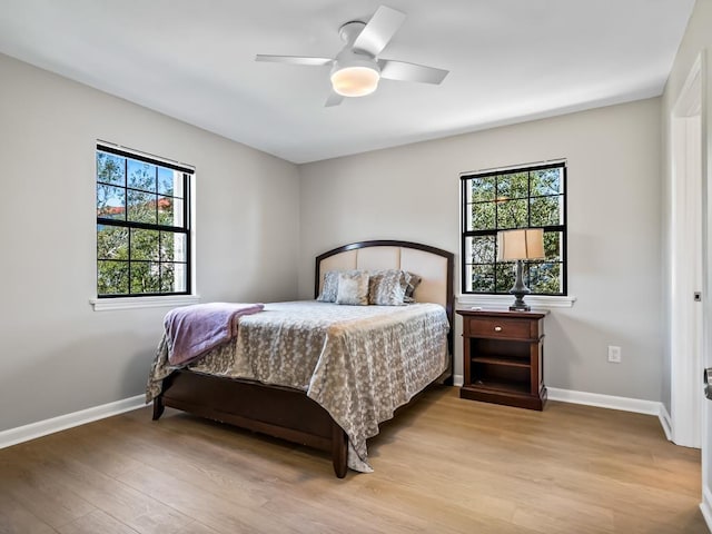 bedroom featuring ceiling fan and light wood-type flooring