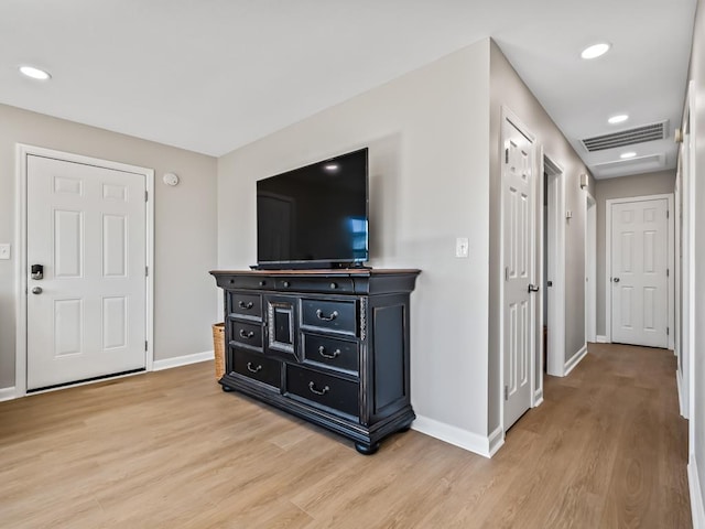 living room with light hardwood / wood-style floors