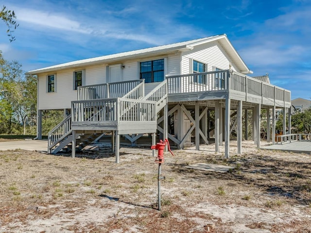 rear view of house with a deck