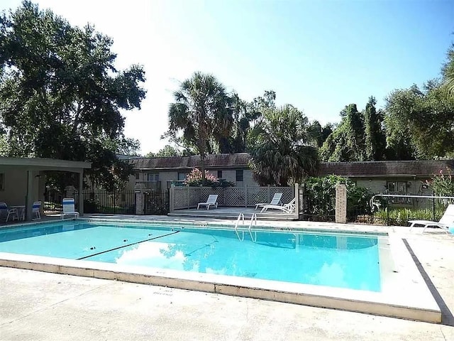 view of swimming pool featuring a patio area