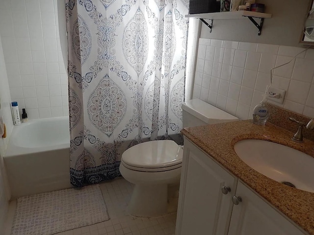 full bathroom featuring vanity, shower / bath combo, tile patterned floors, toilet, and tile walls