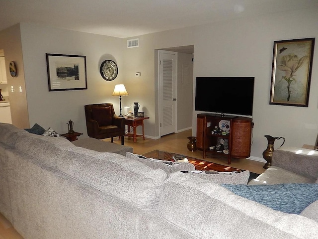 living room with hardwood / wood-style floors