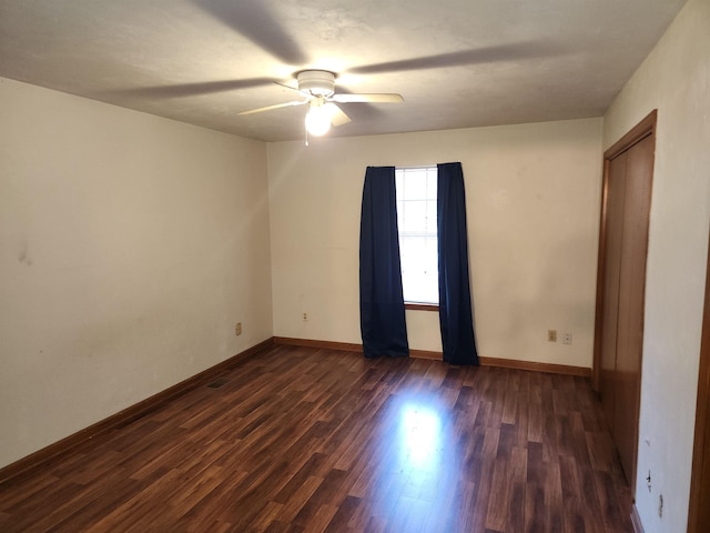 755 Gold Nugget Trl, Tallahassee, FL 32304 - empty room featuring ceiling fan and dark wood-type flooring