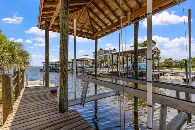 view of dock with a water view