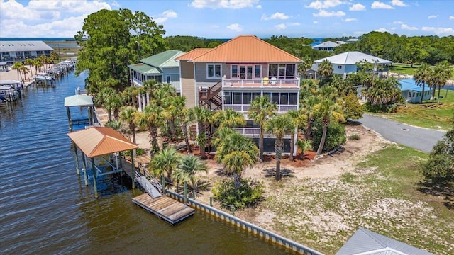 birds eye view of property featuring a water view