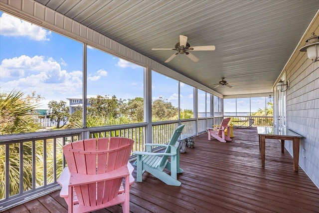 sunroom / solarium with ceiling fan