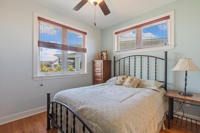 bedroom featuring wood-type flooring and ceiling fan