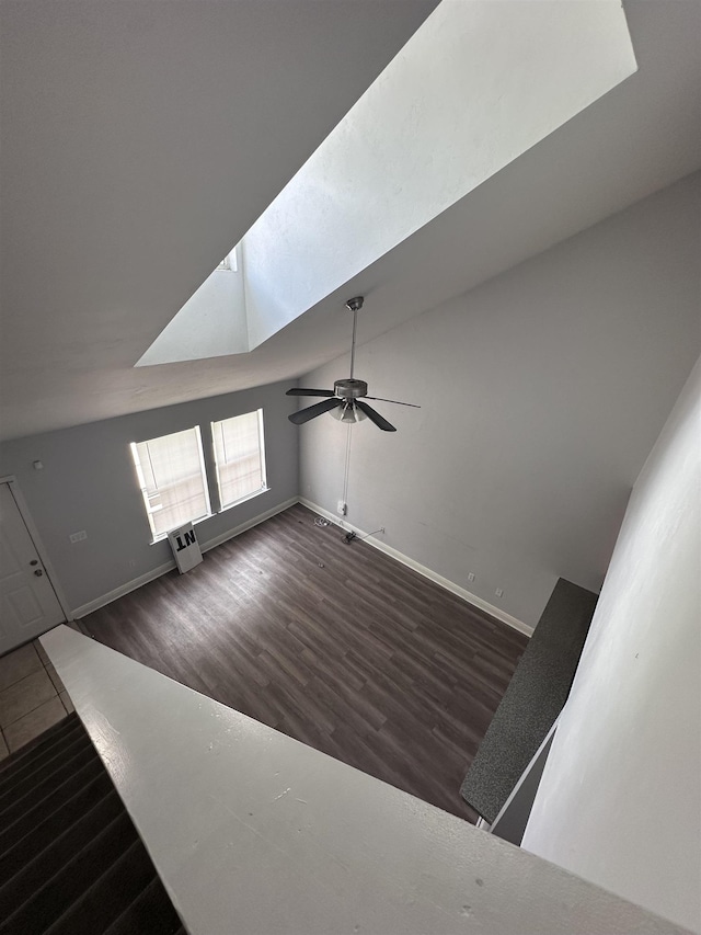 3340 Sugar Berry Way, Tallahassee, FL 32303 - unfurnished living room featuring wood finished floors, ceiling fan, and vaulted ceiling