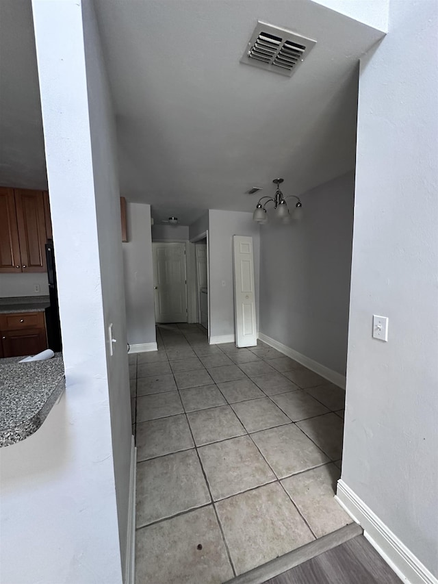 3340 Sugar Berry Way, Tallahassee, FL 32303 - bathroom featuring tile patterned flooring and a chandelier