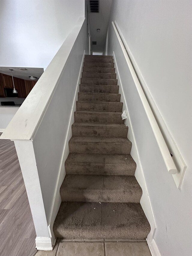3340 Sugar Berry Way, Tallahassee, FL 32303 - stairs with wood finished floors