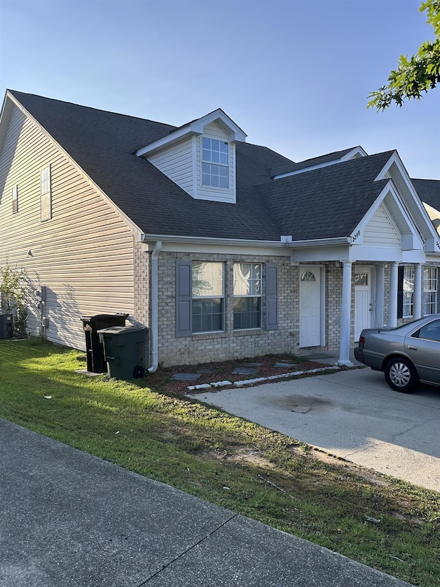 3340 Sugar Berry Way, Tallahassee, FL 32303 - view of front of home featuring brick siding and roof with shingles