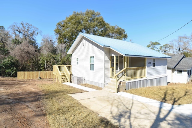 view of front of home with a front lawn and a porch