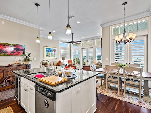45 Walker Creek Dr, Shell Point, FL 32327 - kitchen with dishwasher, ornamental molding, dark wood-style floors, ceiling fan, and white cabinetry