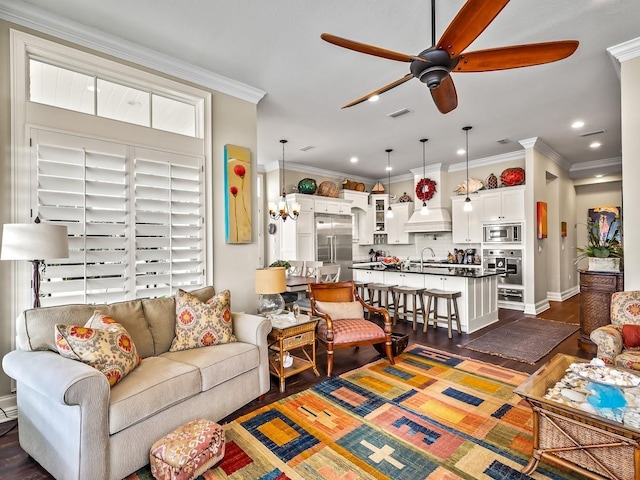 45 Walker Creek Dr, Shell Point, FL 32327 - living room featuring a ceiling fan, ornamental molding, dark wood-type flooring, and recessed lighting
