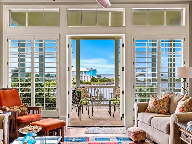 45 Walker Creek Dr, Shell Point, FL 32327 - doorway to outside with plenty of natural light and a water view