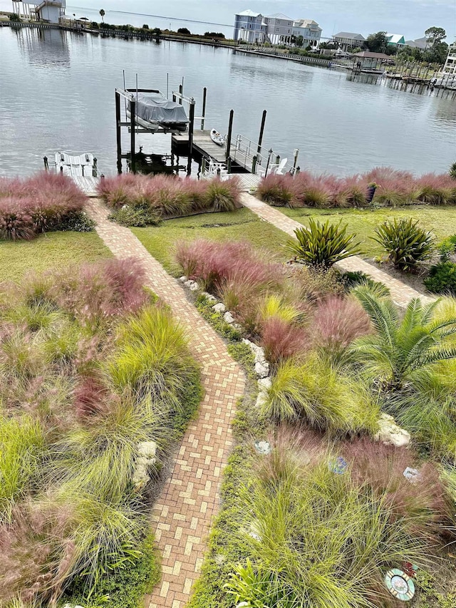 45 Walker Creek Dr, Shell Point, FL 32327 - dock area featuring boat lift and a water view