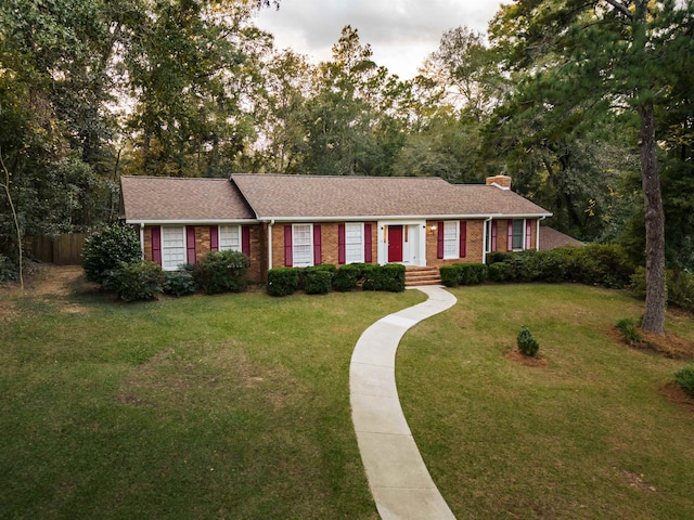 ranch-style house with a front yard